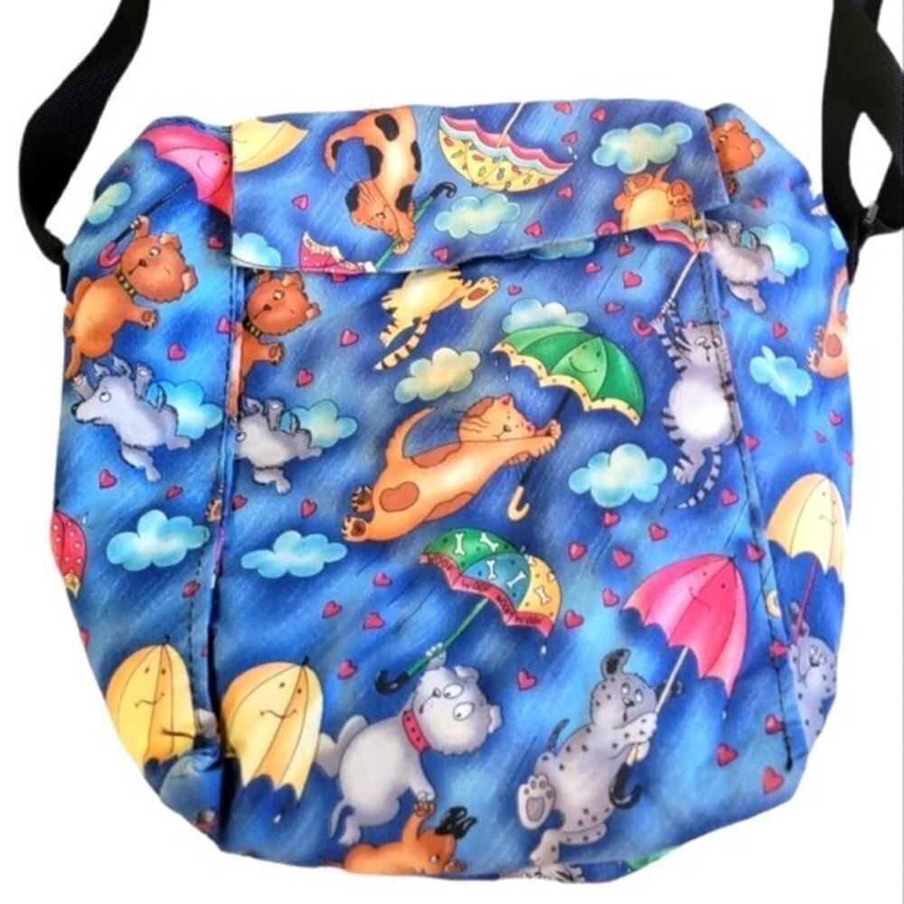 𝅺flying cats and dogs shoulder bag